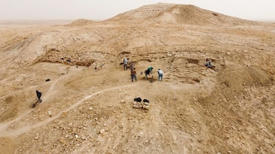 Foreign archaeologists from excavation missions work at discovered archaeological sites dating back to the Sumerian era, in the ancient city of Eridu near Nassiriya, Iraq, March 10, 2022. Reuters