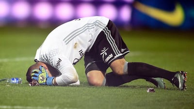 Lyon goalkeeper Anthony Lopes reacts after a firecracker exploded near him during his club's Saturday, December 3, 2016 match with Metz at Saint Symphorien stadium in Longeville-Les-Metz, eastern France. Jean-Christophe Verhaegen / AFP