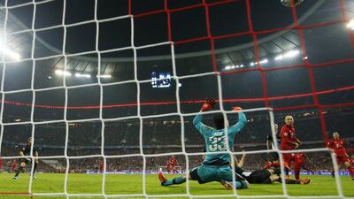 Arjen Robben of Bayern Munich scores the fourth goal against Arsenal on Wednesday night in the Champions League. John Sibley / Action Images / Reuters