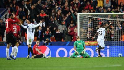 Phil Jones reacts after he scores an own goal during the match between Valencia and Manchester United. GETTY IMAGES