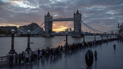 People queue near Tower Bridge, London to pay their respects after the death of Britain's Queen Elizabeth. Reuters