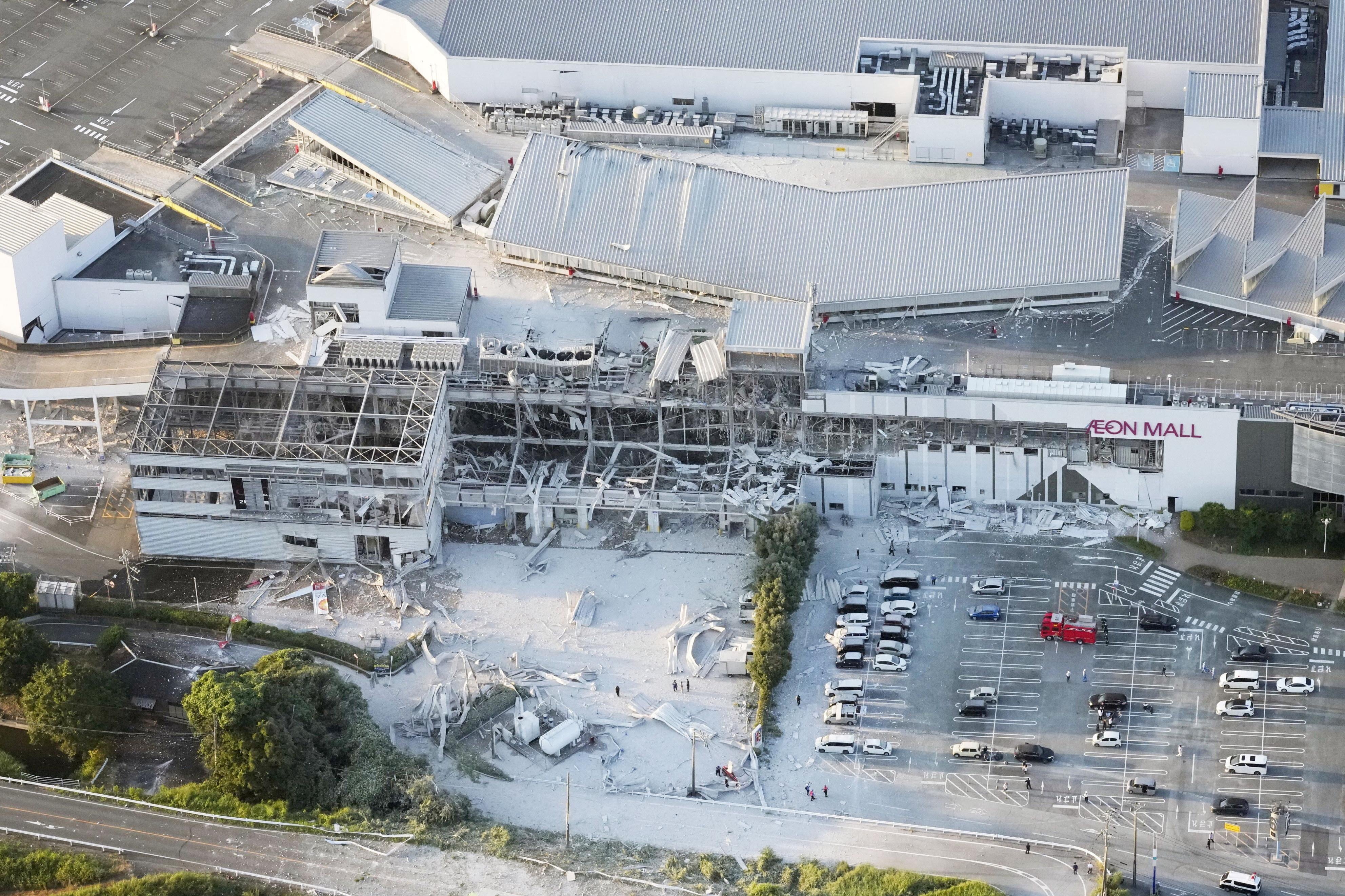 Japan earthquake: Several feared dead as dozens trapped inside collapsed shopping mall