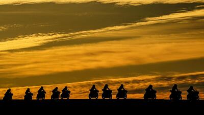 Riders go over Lukey Heights as they compete in the Oceania Junior Cup race three during the World Superbike Championship on Phillip Island, Victoria, Australia. EPA