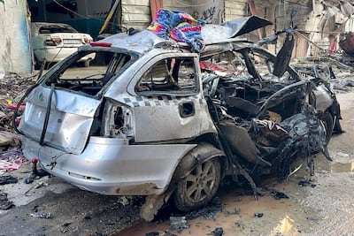 The car in which three sons of Hamas leader Ismail Haniyeh were killed in an Israeli air strike, near the Beach refugee camp, west of Gaza city, on Wednesday. AFP