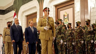 Iraqi Prime Minister Mustafa Al-Kadhimi receives Egyptian President Abdel Fattah El-Sisi in Baghdad. Iraqi Prime Minister Media Office, Handout via REUTERS