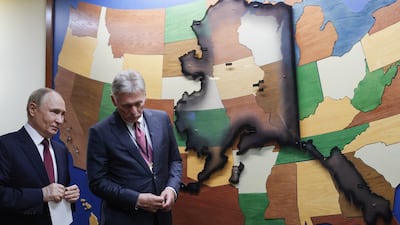 Russian President Vladimir Putin is accompanied by Kremlin spokesman Dmitry Peskov, following a meeting with US President Donald Trump at Joint Base Elmendorf-Richardson in Anchorage, Alaska. EPA