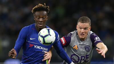 Tammy Abraham and Shane Lowry of Perth Glory contest for the ball. Getty Images