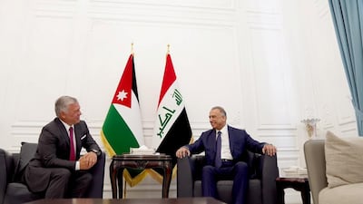 Iraqi Prime Minister Mustafa Al-Kadhimi receives King Abdullah II of Jordan in Baghdad. Iraqi Prime Minister Media Office/Handout via REUTERS