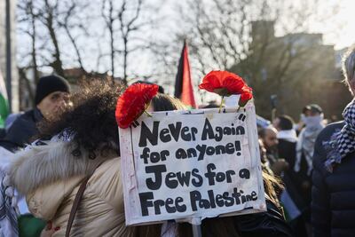 A protester outside the International Court of Justice during the court ruling in The Hague, Netherlands. Bloomberg