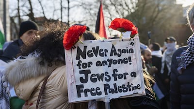 A protester outside the International Court of Justice during the court ruling in The Hague on Friday. Bloomberg