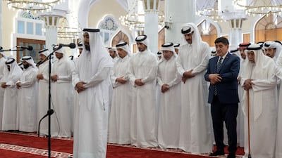 Qatari Emir Sheikh Tamim attends the funeral prayers in Doha. Reuters
