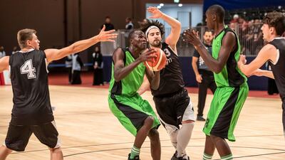 A basketball match between Kenya and Belgium.