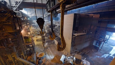 A front loader moves across the floor of the melt shop. Oli Scarff / AFP
