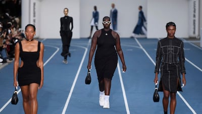 Models present creations by Marine Serre during the menswear ready-to-wear spring/summer 2023 at Fashion Week in Paris on June 25, 2022. AFP