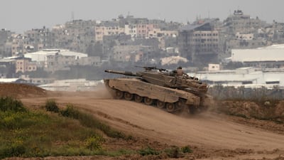 An Israeli tank moves near the border with the Gaza Strip on March 17, 2024 in southern Israel. Getty Images