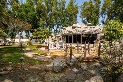 The stone tavern in the garden. Courtesy LuxuryProperty.com