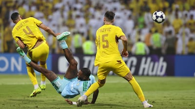 Al Ahli's Ivan Toney attempts a bicycle kick. Chris Whiteoak / The National