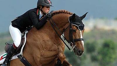 Sheikha Latifa rides Kalaska de Semily as she competes in the equestrian jumping team event.
