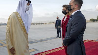 Minister of Economy, Abdulla bin Touq, greets Volodymyr Zelenskiy, President of Ukraine, at the presidential terminal at Abu Dhabi International Airport. Mohamed Al Hammadi / Ministry of Presidential Affairs