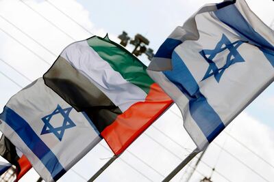 Israeli and UAE flags line a road in the Israeli coastal city of Netanya. AFP