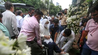 Simone Tata, centre, stepmother of Indian industrialist Ratan Tata, leaves after attending the funeral of Cyrus Mistry, in Mumbai. EPA
