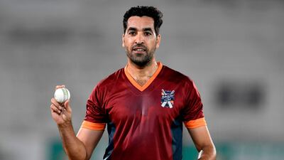 Pakistani cricketer Umar Gul holds a ball before the start of his final match in Rawalpindi on October 16, 2020. AFP