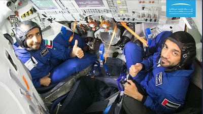Hazza Al Mansouri and Sultan Al Neyadi undergo simulation training in the Russian Soyuz spacecraft that will take them to the International Space Station next year. Courtesy Mohammed bin Rashid Space Centre