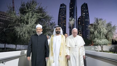 ABU DHABI, UNITED ARAB EMIRATES - February 04, 2019: Day two of the UAE papal visit - HH Sheikh Mohamed bin Rashid Al Maktoum, Vice-President, Prime Minister of the UAE, Ruler of Dubai and Minister of Defence (C), His Holiness Pope Francis, Head of the Catholic Church (R) and His Eminence Dr Ahmad Al Tayyeb, Grand Imam of the Al Azhar Al Sharif (L), arrive at the Human Fraternity Meeting, at The Founders Memorial. ( Mohamed Al Hammadi / Ministry of Presidential Affairs ) ---