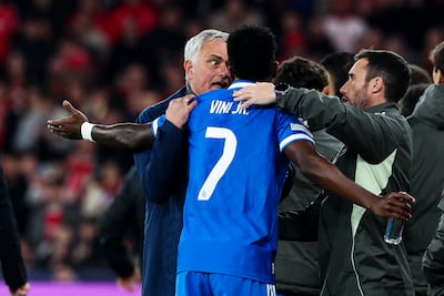 Benfica's head coach Jose Mourinho speaks to Real Madrid's Vinicius Junior as he leaves the pitch citing racial abuse. EPA