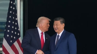 President Donald Trump and Chinese President Xi Jinping shake hands after their US-China summit talk in Busan, South Korea. AP