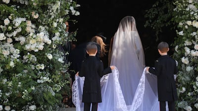Meghan Markle and her bridal party arrive at St George's Chapel at Windsor Castle for her wedding to Prince Harry on May 19, 2018 in Windsor, England