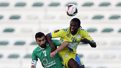 Azizbek Haydarov’s Al Shabab, in green, were put under pressure by Makhete Diop’s Al Dhafra on Friday. Ashraf Al Amra / Al Ittihad