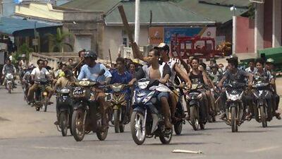Sectarian violence has spread to a new region of Myanmar, with hundreds of Buddhists on motorcycles armed with sticks patrolling the streets of Lashio, northern Shan State.
