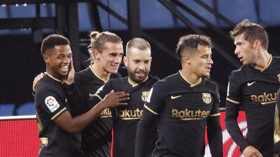 Ansu Fati, left, celebrates after giving Barcelona the lead at Balaidos Stadium in Vigo. EPA
