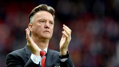 Manchester United manager Louis Van Gaal applauds the crowd after their Premier League match against Arsenal last Sunday. Nigel Roddis / EPA / May 17, 2015