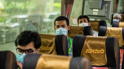 Hajj pilgrims leave for Makkah after arriving at King Abdulaziz International Airport in Jeddah on July 25, 2020. Saudi Ministry of Hajj and Umra / AFP