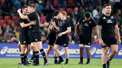 New Zealand players celebrate after their victory against South Africa. AFP