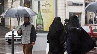 Women wearing niqabs walk in Marseille. France has banned the full face veil, despite officials admitting they have no idea of the number of women who wear it. (REUTERS/Jean-Paul Pelissier)