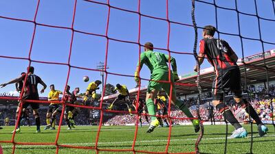 Aston Villa’s French-born Beninese striker Rudy Gestede jumps to head the opening goal of the Premier League match between Bournemouth and Villa at the Vitality Stadium in Bournemouth. Aston Villa won the game 1-0. AFP PHOTO / GLYN KIRK