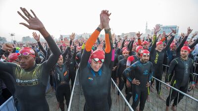 Amateur participants before the Ironman race at Jumeirah beach in Dubai. Leslie Pableo for The National