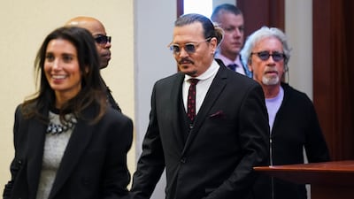 Depp walks into the courtroom for Day 17 of testimony. AP
