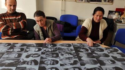 Bosnian Muslims, from left, Zijad Smajlovic, Sabaheta Fejzic and Kadira Gabeljic, are survivors of the 1995 massacre in the Eastern-Bosnian town of Srebrenica. Elvis Barukcic/AFP Photo