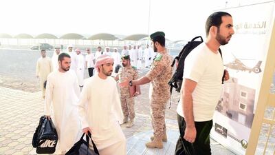 The national service recruits arrive at one of the various training camps. WAM