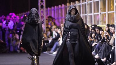 Abeer Al Suwaidi’s abayas on the catwalk. Jaime Puebla / The National