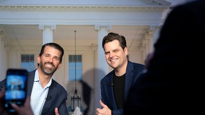 Mr Trump Jr and Florida representative Matt Gaetz during a radio show at the conference. AP