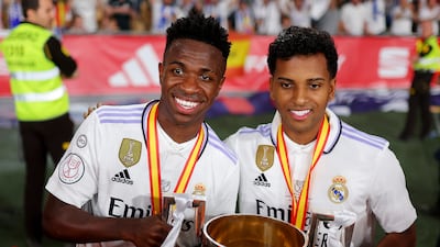 Vinicius Junior and Rodrygo pose with the Copa del Rey trophy after their starring roles for Real Madrid in the final victory over Osasuna. Getty