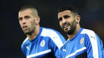 Islam Slimani, left, moved to Newcastle United, while Riyad Mahrez stayed put at Leicester City. Oli Scarff / AFP