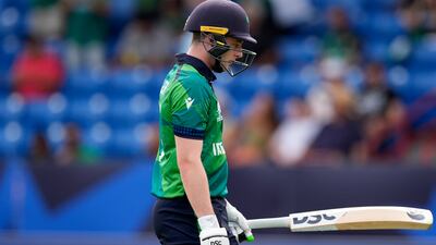 Ireland captain Lorcan Tucker leaves the field after losing his wicket to Pakistan's Mohammad Amir for one run. AP