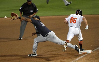 New York Yankees' Chris Gittens reaches for the ball. AP