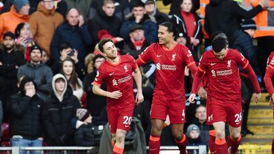 Liverpool's Diogo Jota, left, celebrates with teammates after opening the scoring. EPA